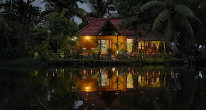 Ours is a one bedroom villa just at the canalfront of the Kumarakom Backwaters.