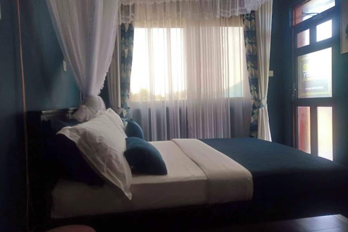 Chambre simple exécutive | Draps en coton égyptien, literie de qualité, minibar, décor unique