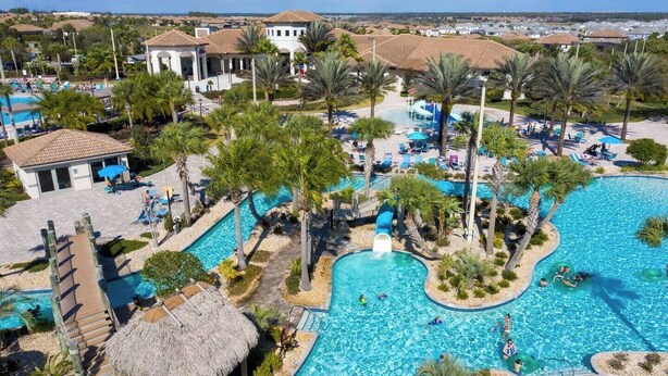 A resort with multiple swimming pools, palm trees, and lounge areas. - Modern 4Bed+PrivatePool Resort Style 8959 (Davenport)