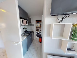 Fridge, microwave, cookware/dishes/utensils