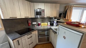 Private kitchen - Cozy studio at the slopes, Le Lioran (Le Lioran)
