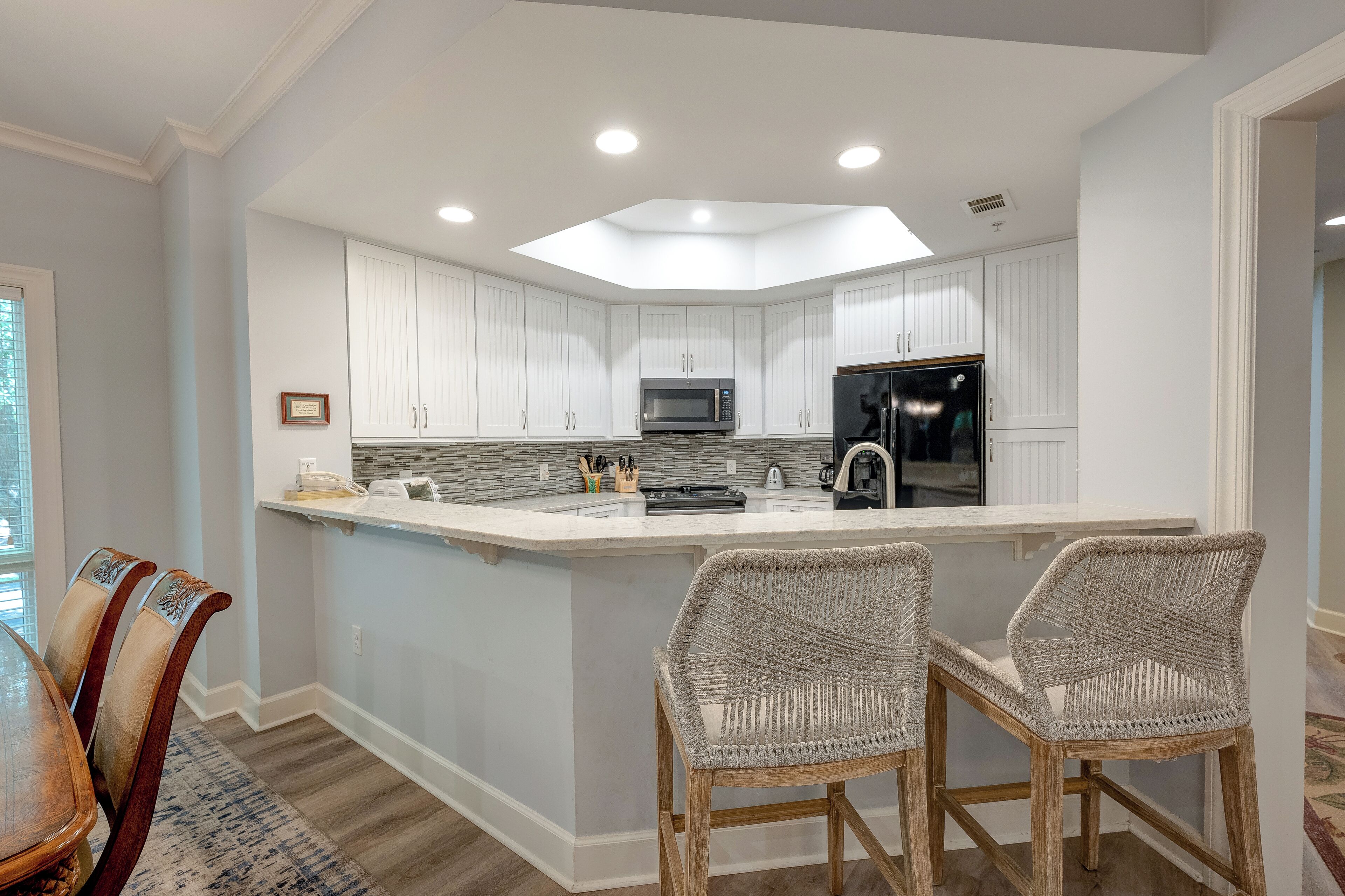 Fridge, microwave, dishwasher, cookware/dishes/utensils