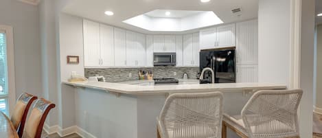 Fridge, microwave, dishwasher, cookware/dishes/utensils