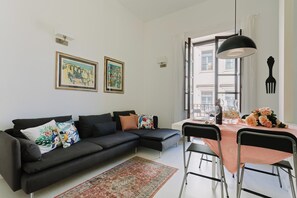 Apartment, 2 Bedrooms | Living area | 30-inch TV with cable channels - Suite La Piazza by Wonderful Italy (Syracuse)