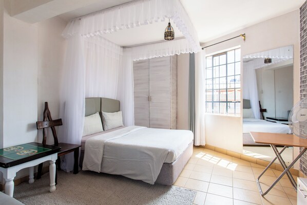 1 bedroom, bed sheets - Sunny Spacious Studio (Nairobi)