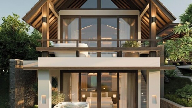 A modern two-story house with a prominent wooden gable roof, large windows, and a hot tub in the front yard. - Sandesh Water Edge Kabini  (Heggadadevankote)