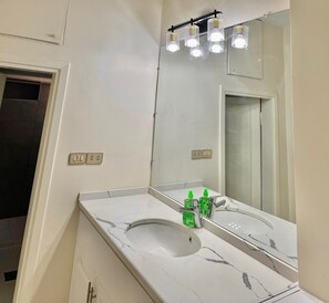 Bidet, towels, soap, shampoo