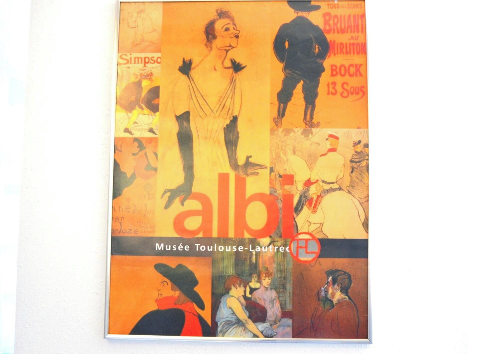A poster with various illustrations and text, including 'Simpson,' 'albi,' and 'Musée Toulouse-Lautrec.'