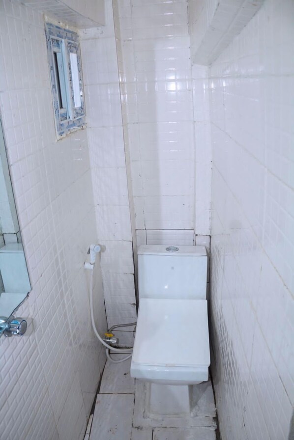 Shower, towels, soap, shampoo