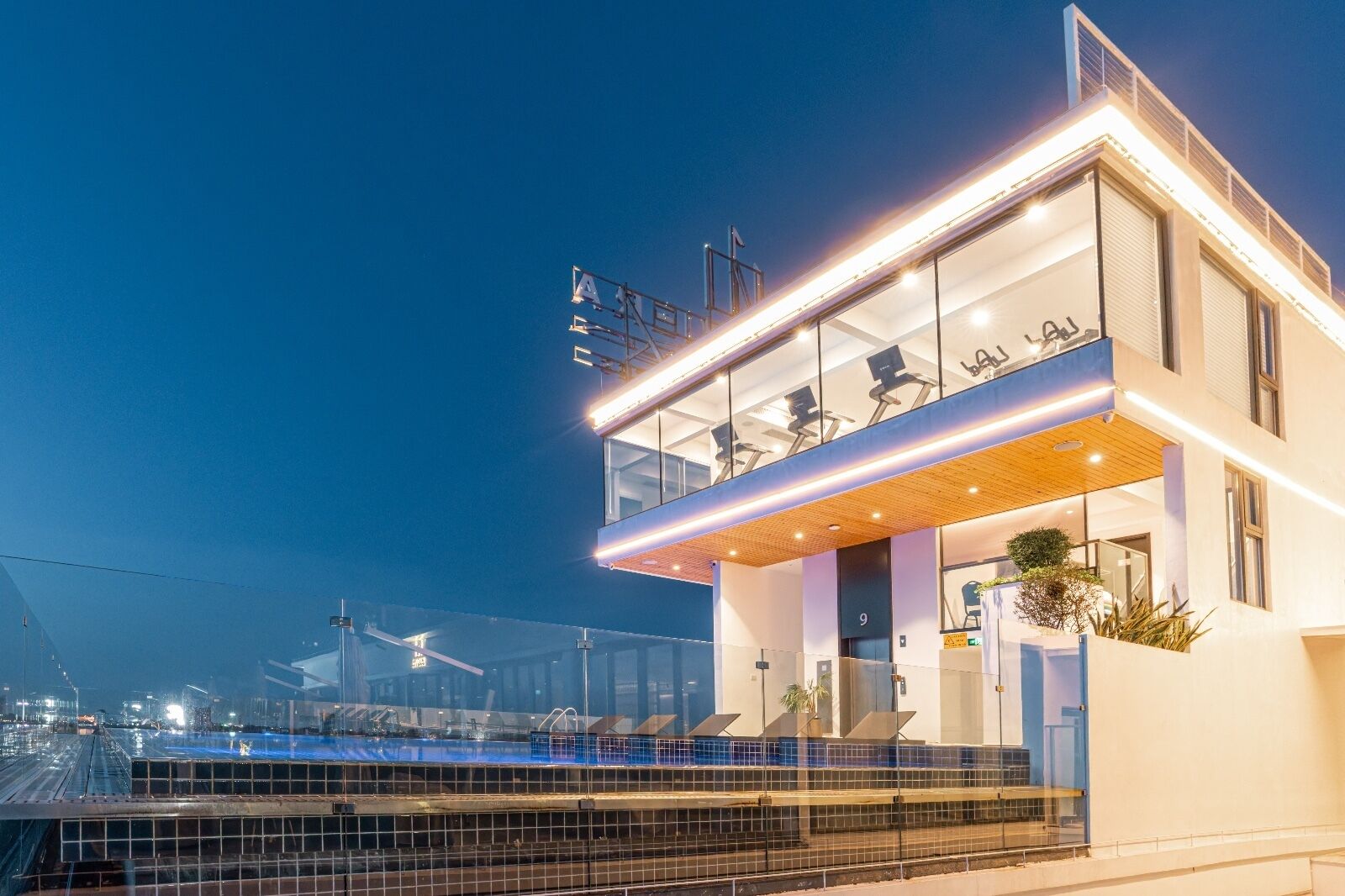 Outdoor pool, open 7:00 AM to 9:00 PM, pool umbrellas, sun loungers