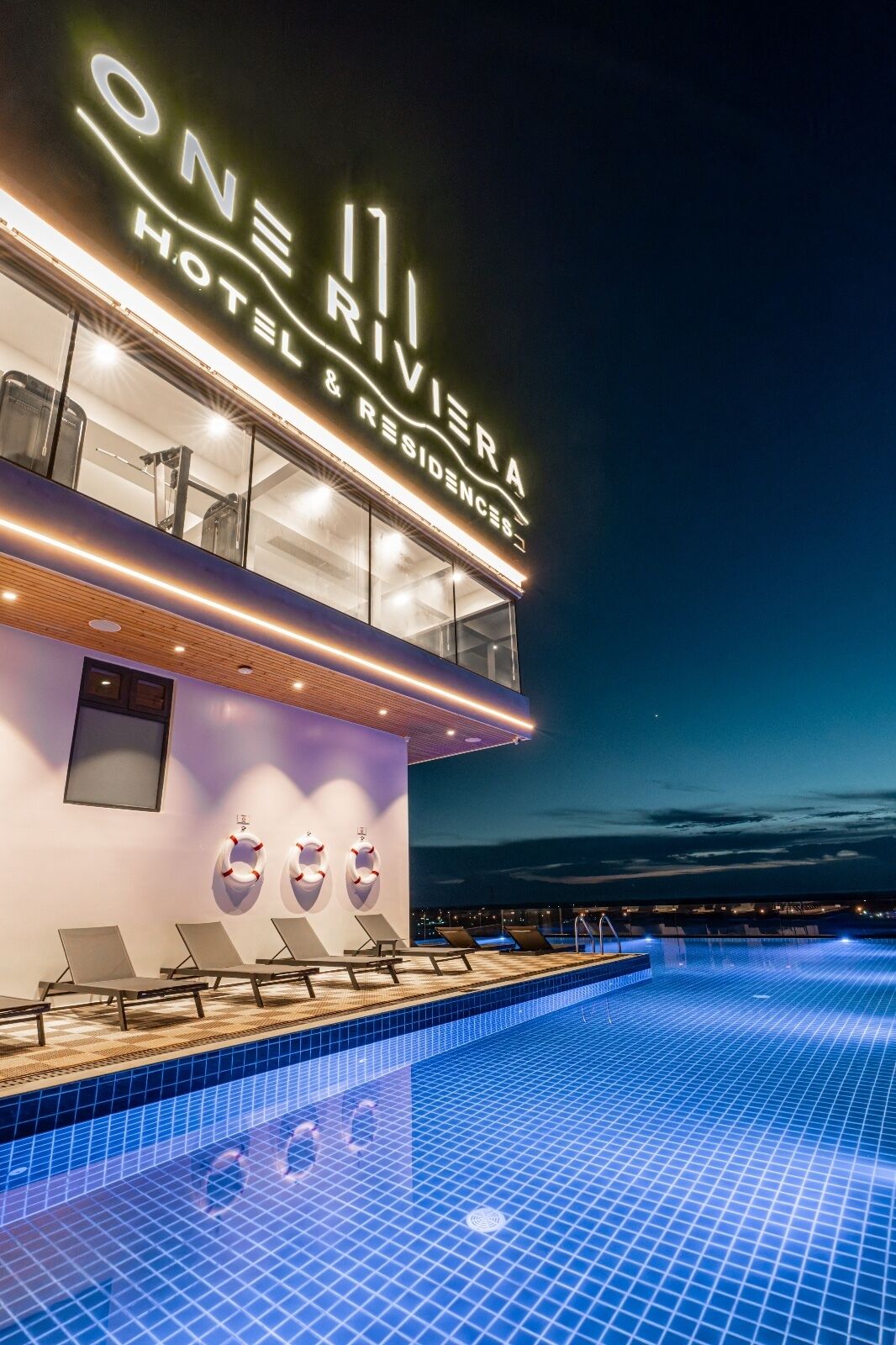 Outdoor pool, open 7:00 AM to 9:00 PM, pool umbrellas, pool loungers