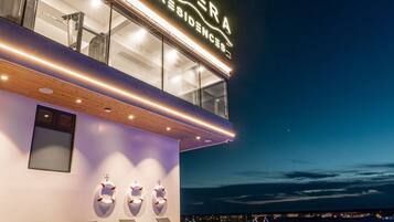 Outdoor pool, open 7:00 AM to 9:00 PM, pool umbrellas, pool loungers