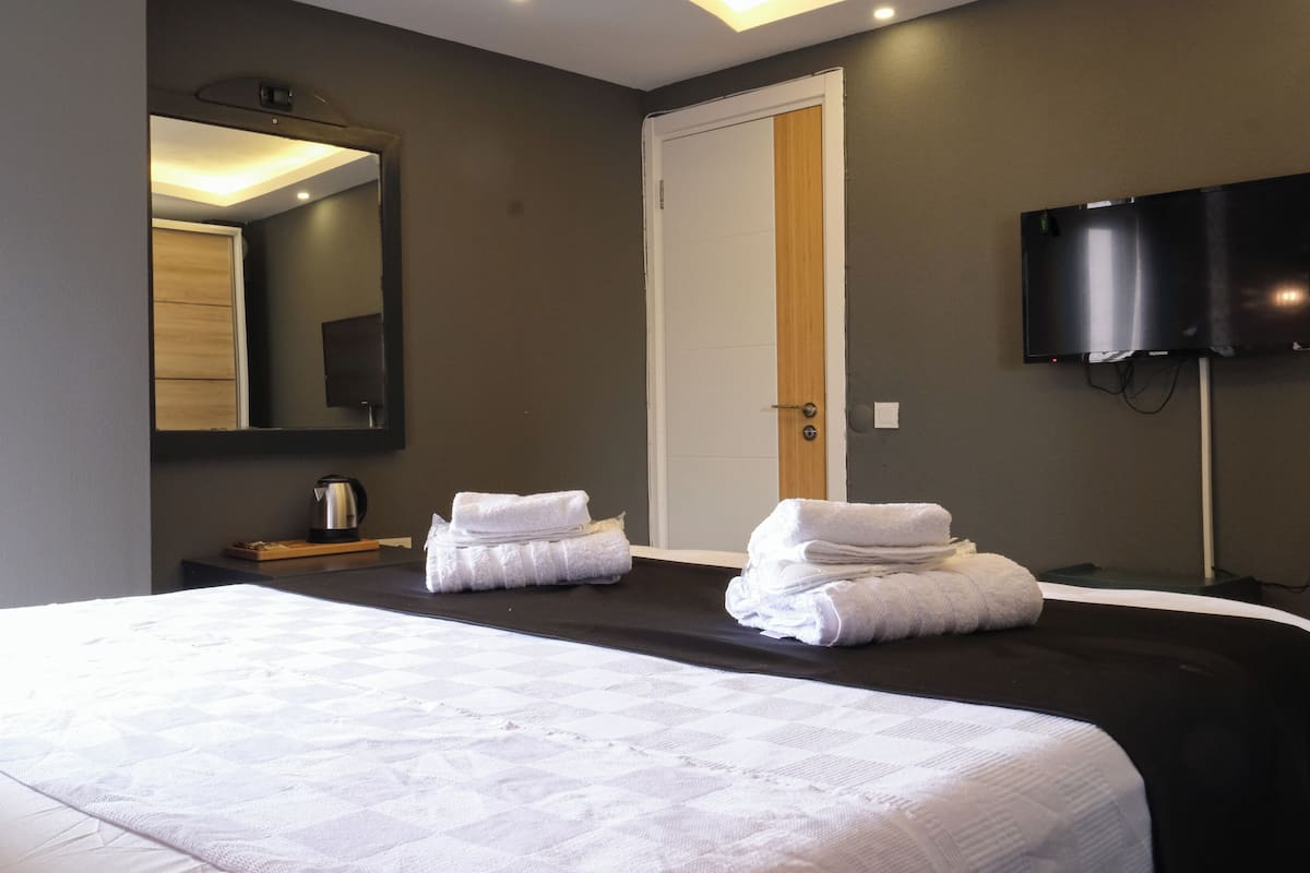 Classic Room, Pool View, Poolside | Laptop workspace, iron/ironing board (on request), bed sheets