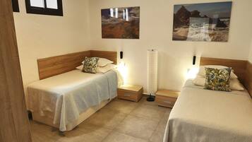 2 habitaciones, tabla de planchar con plancha, wifi y ropa de cama