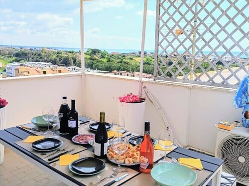 Attico con Terrazza Vista Mare Full Optional