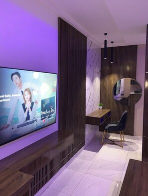 Executive Apartment | Living area | TV