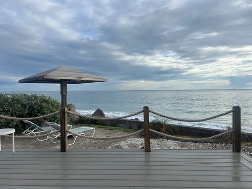 2-bed loft-style condo on the water, WiFi, pool, AC; walk to restaurants & beach
