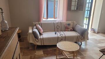 Smart TV, fireplace, table football, books