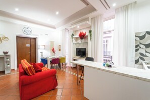 Apartment | Living area | 35-inch flat-screen TV with digital channels - Yellow City Apartment by Wonderful Italy (Naples)