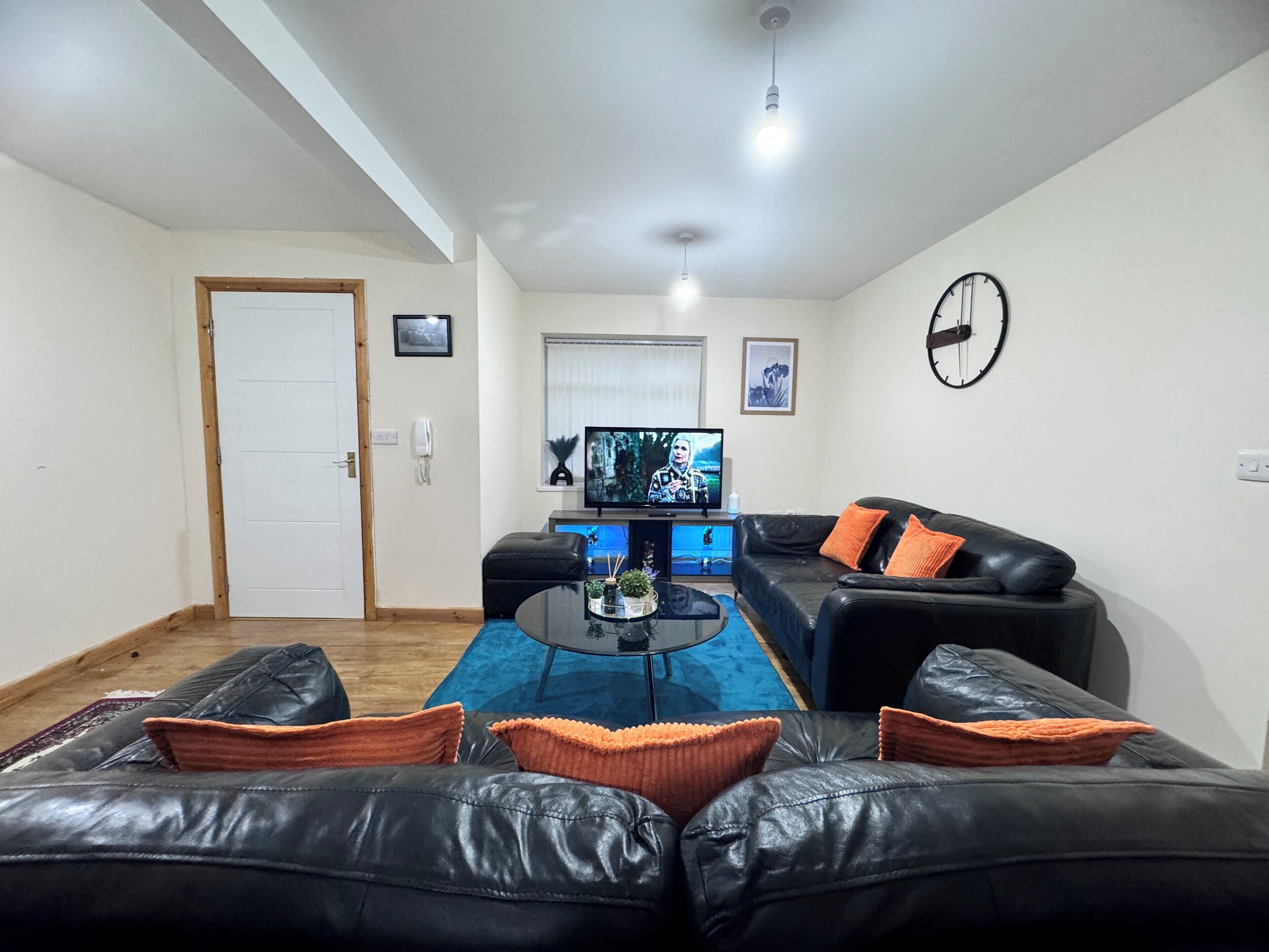 Appartement, vue jardin | Coin séjour | Télévision à écran plat