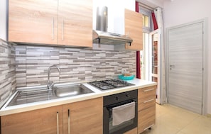 Fridge, stovetop, coffee/tea maker, cookware/dishes/utensils