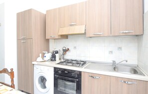 Fridge, stovetop, coffee/tea maker, cookware/dishes/utensils