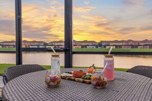 Outdoor dining - Lakeview Pool home near Disney - 5BR 4BA with free access to Resort amenities (Kissimmee)