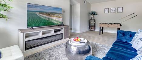 Smart TV, fireplace, table football, ping pong