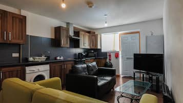 Apartamento | Zona de estar | Una televisión de pantalla plana