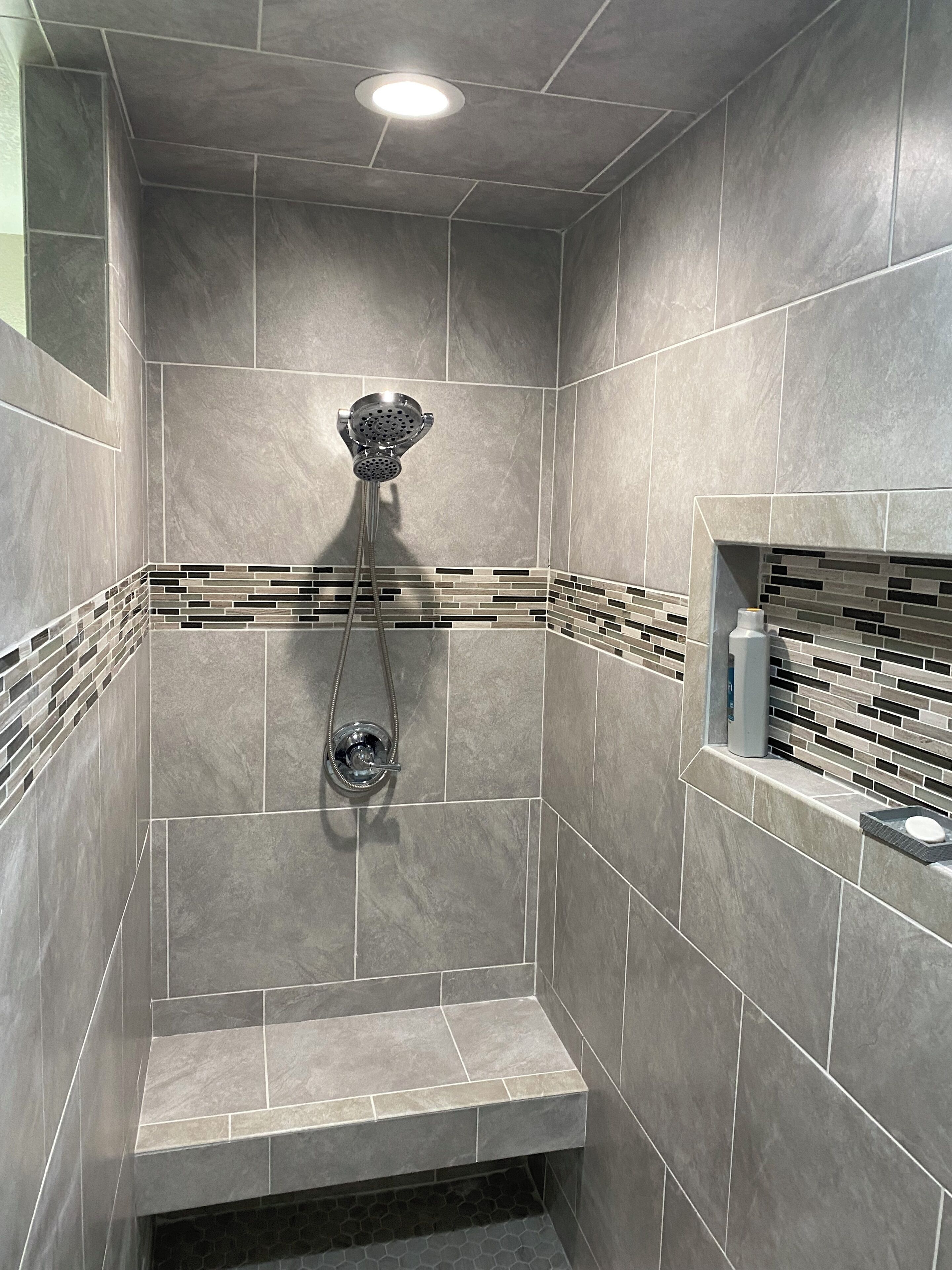 Shower, hair dryer, towels, toilet paper