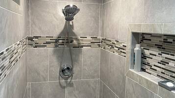 Shower, hair dryer, towels, toilet paper