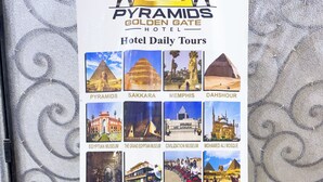 A promotional display for Pyramids Golden Gate Hotel's daily tours, featuring various Egyptian landmarks. - Sneferu Pyramids Golden Gate (Giza)