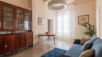 Apartment | Living area | 35-inch flat-screen TV with digital channels