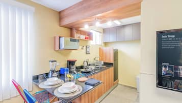 Fridge, microwave, stovetop, coffee/tea maker