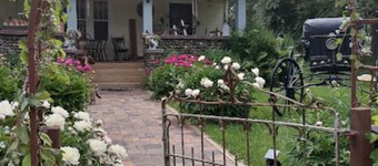 Relax in our English Garden King Suite at The Cobblestone Bed & Breakfast