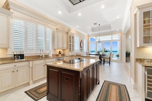 Fridge, microwave, oven, stovetop - Biltmore Beach House | Luxury 5-Br Beachfront Pool & Spa House | Sleeps 10 (Bonita Springs)