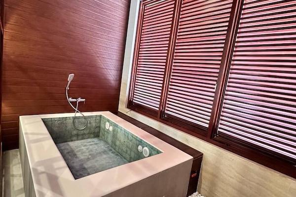 Standard Villa, Non Smoking | Bathroom | Combined shower/tub, deep soaking tub, rainfall showerhead