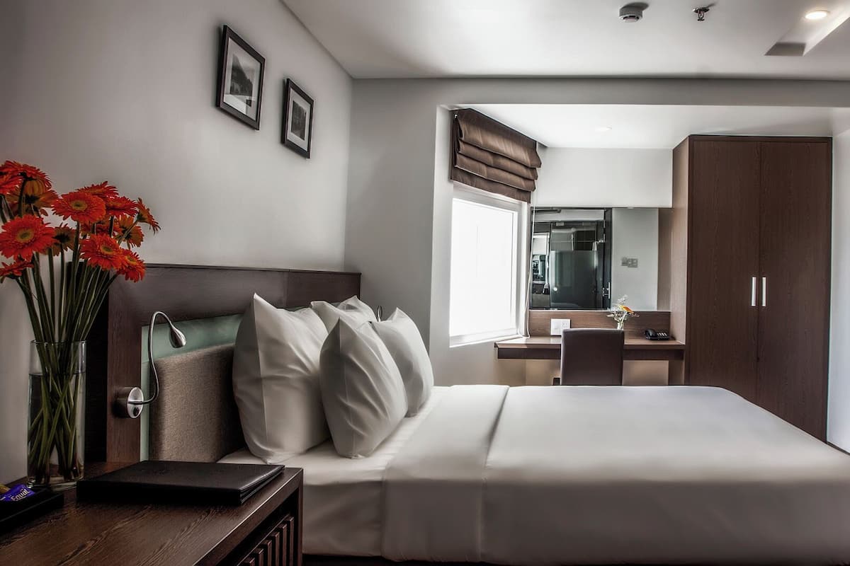 Habitación ejecutiva con 1 cama matrimonial o 2 individuales, vista a la ciudad | Caja de seguridad en la habitación y insonorización