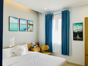 Rom – standard, 1 kingsize-seng, byutsikt | 1 soverom og sengetøy av topp kvalitet