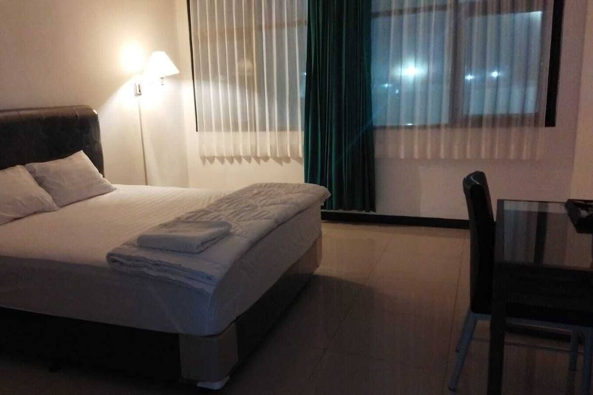 Standard Single Room, Pool View | Desk, free WiFi