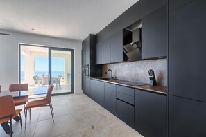 Apartment, 4 Bedrooms | Private kitchen | Full-size fridge, microwave, oven, stovetop - Villa Ultima (Labin)