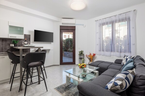 Apartment, 1 Bedroom | Living area | TV - Apartment Isola (Rovinj)
