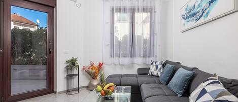 Apartment, 1 Bedroom | Living area | TV