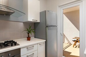 Apartment, 1 Schlafzimmer | Eigene Küche | Großer Kühlschrank, Ofen, Herdplatte, Geschirrspüler