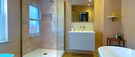 Shower, hair dryer, towels, soap