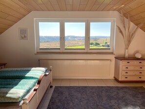 4 bedrooms, iron/ironing board, travel cot, WiFi