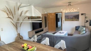 TV, DVD player, foosball, books