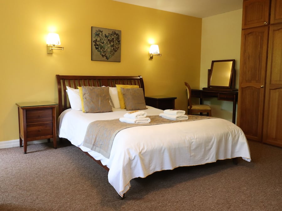 Desk, laptop workspace, free WiFi, bed sheets