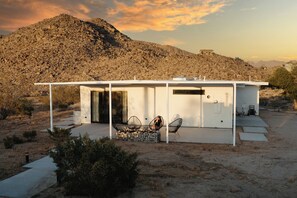 Relax in a setting with a covered patio and comfortable seating.