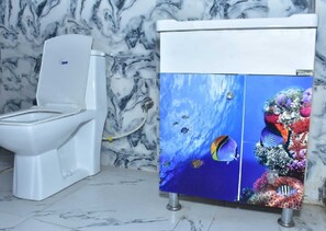 Quarto luxo | Banheiro | Chuveiro, sabonete